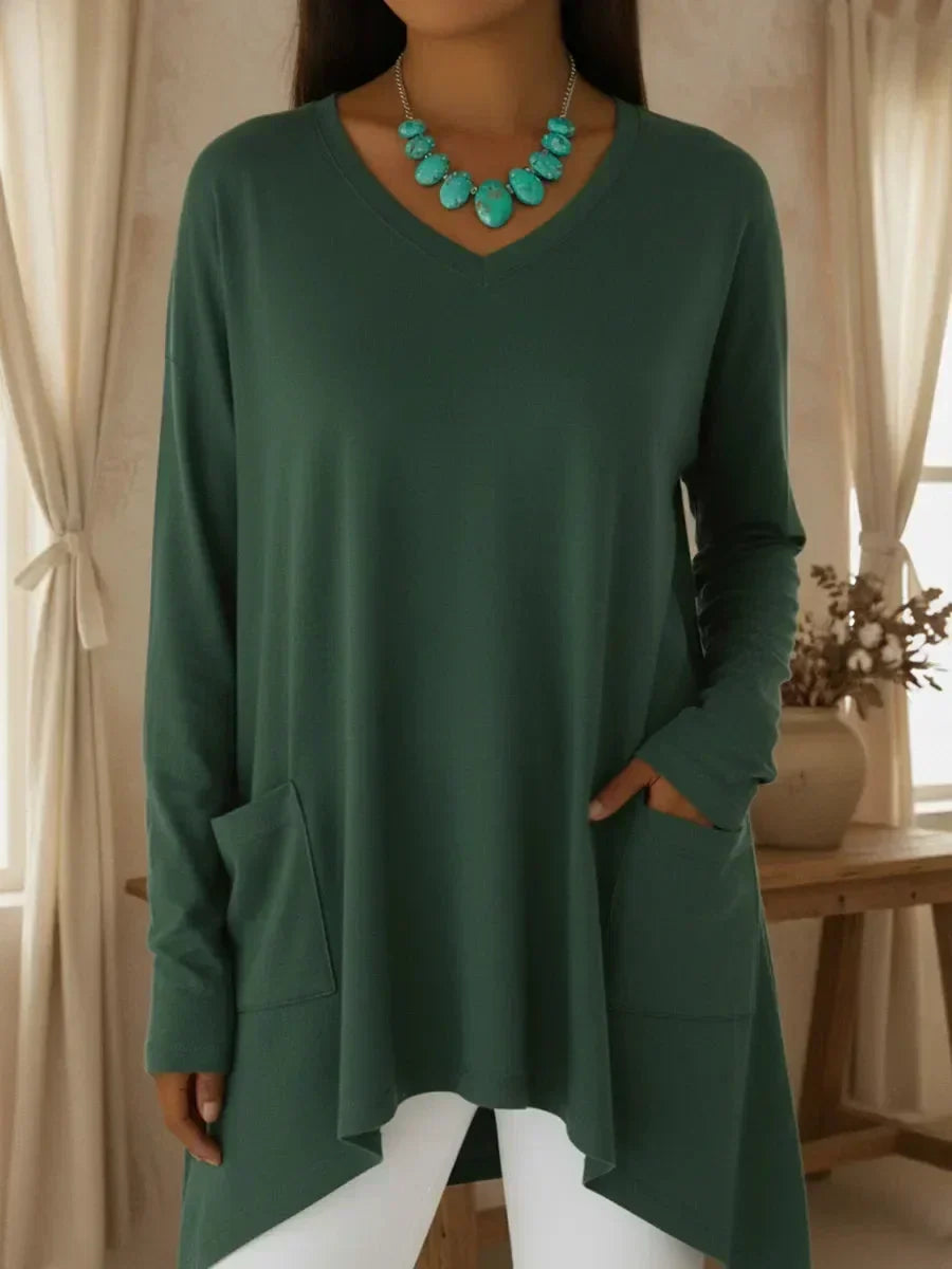Isolde green V-neck loose sweater with front pockets, front view