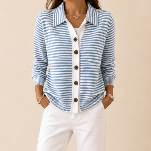 Josefina striped cardigan worn outdoors at a doorway, front view