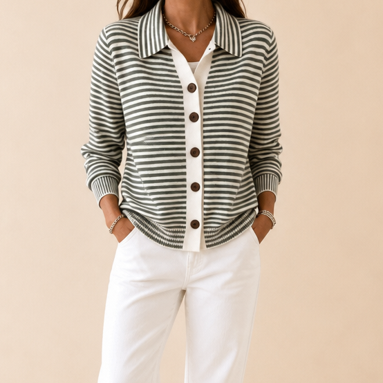 Josefina striped cardigan worn outdoors at a doorway, front view