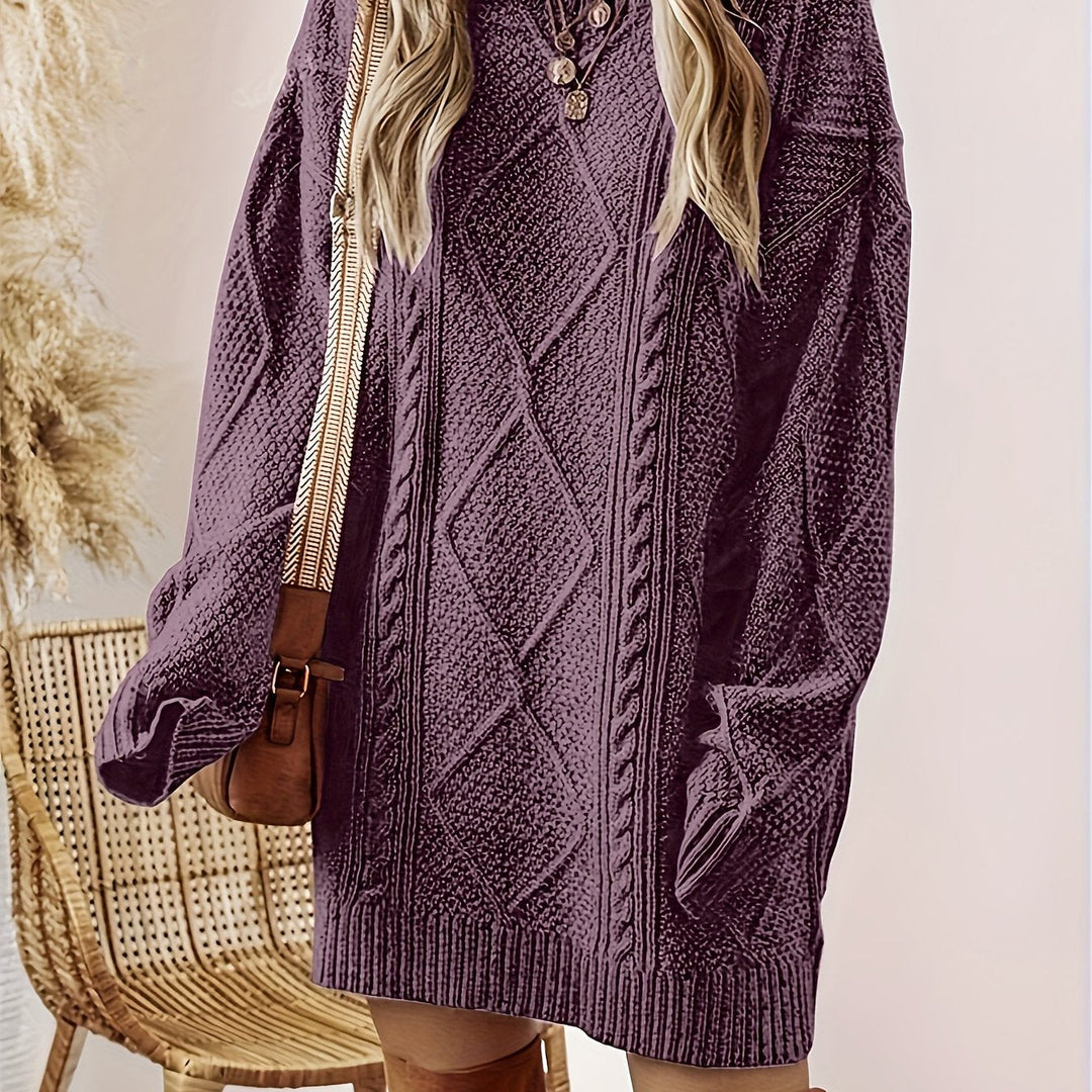 Josephine cable-knit sweater dress, close-up front view of textured knit and neckline