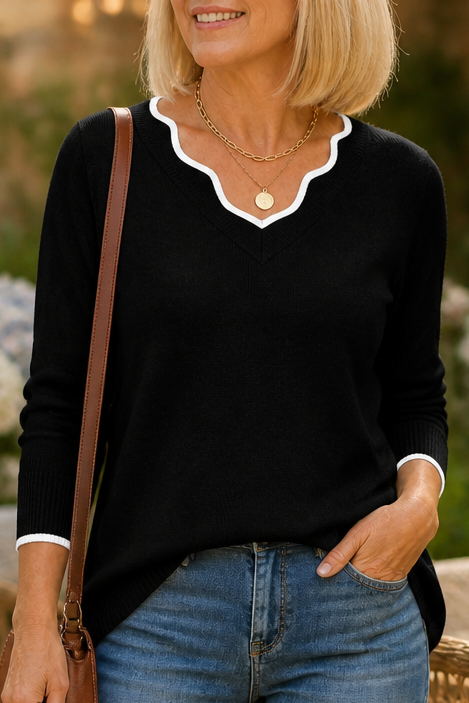 Josephine V-neck knit sweater styled with jeans and ankle boots, indoor setting