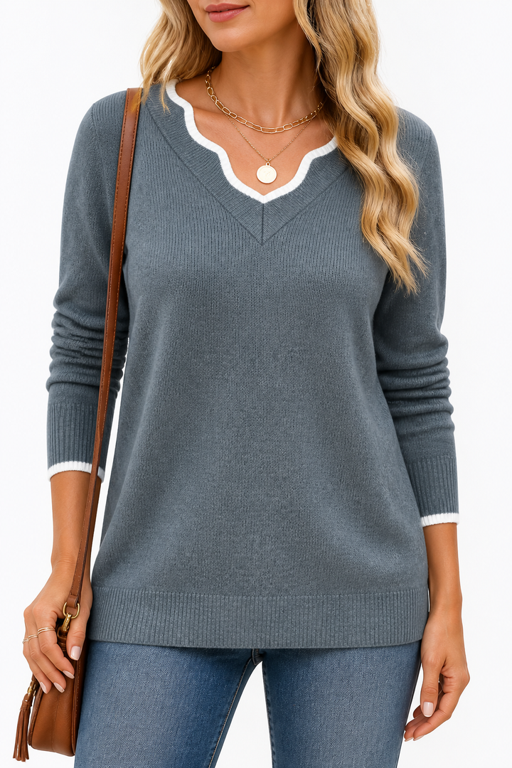 Josephine V-neck knit sweater styled with jeans and ankle boots, indoor setting