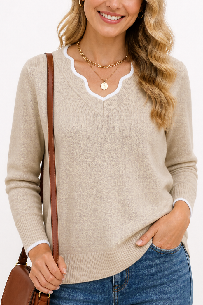 Josephine V-neck knit sweater styled with jeans and ankle boots, indoor setting