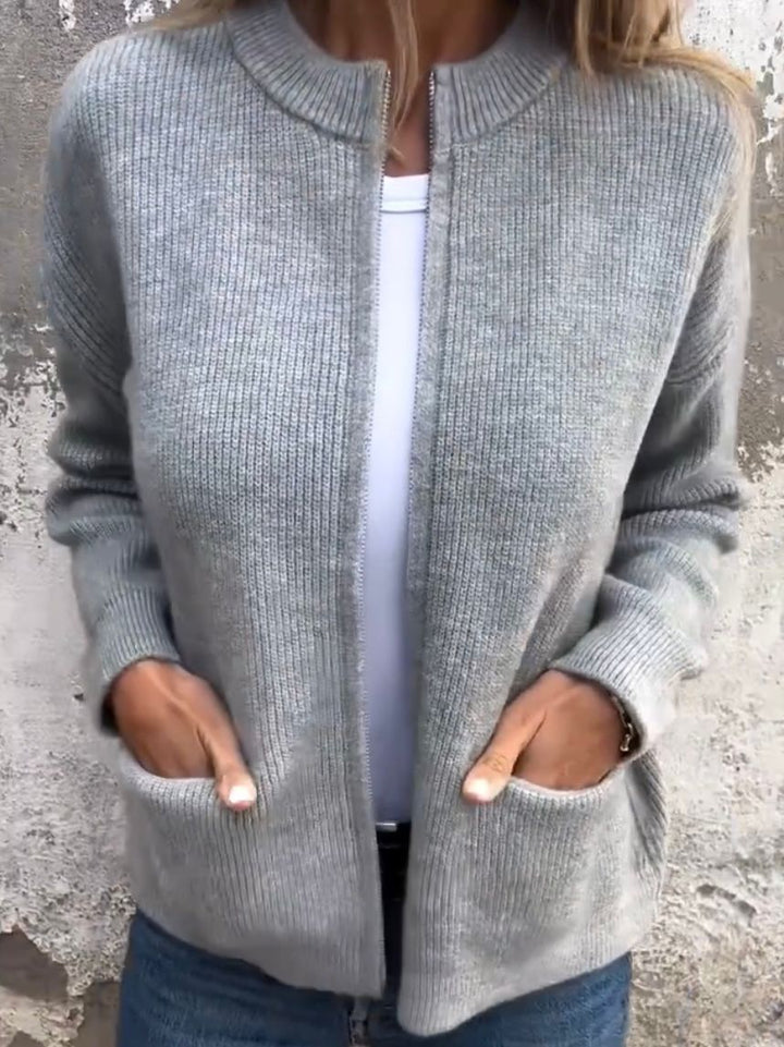 Linda zip-up cardigan in gray, front view with hands in pockets