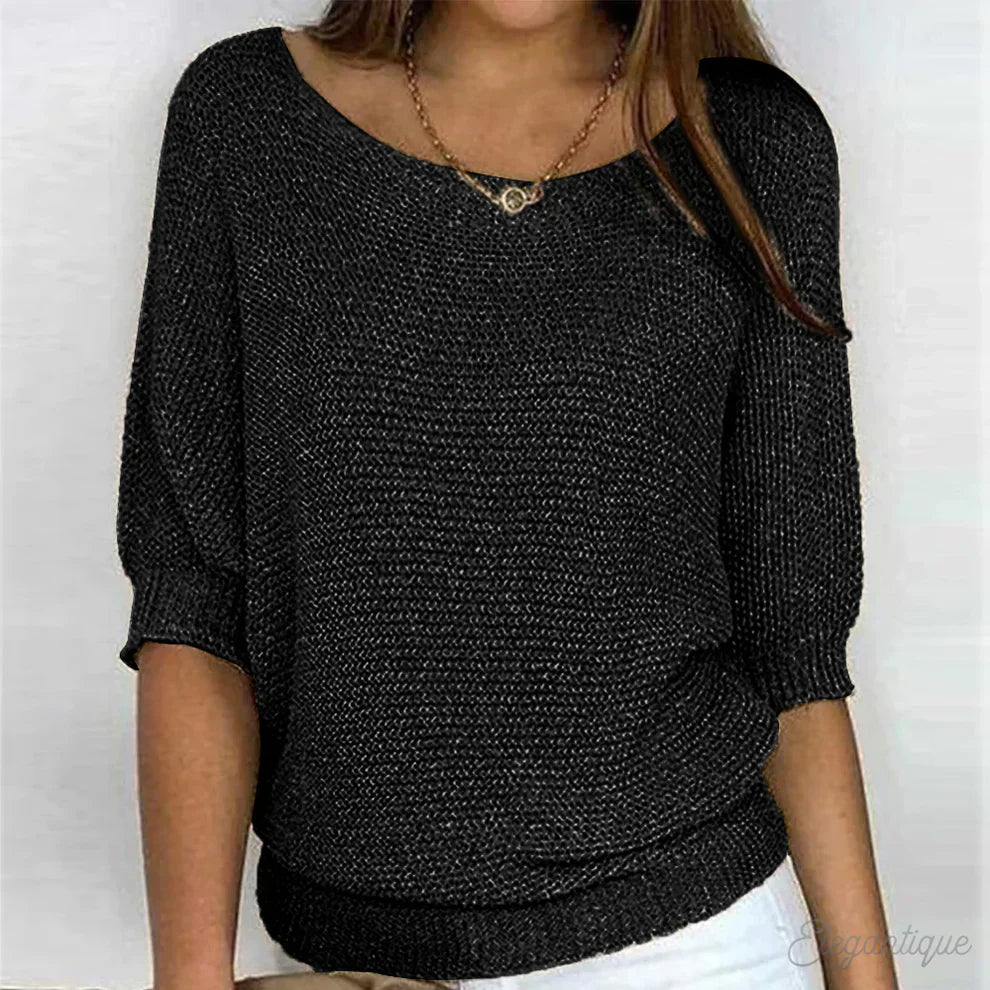 Louisa black knit sweater with ribbed hem, front view