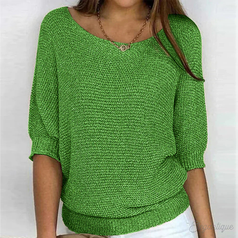 Louisa green knit sweater with batwing sleeves, front view