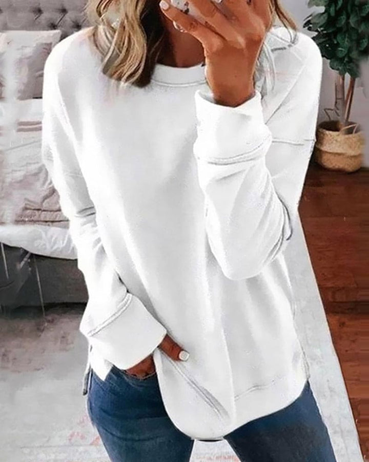 Marcella solid crew neck long sleeve sweatshirt in white, front view