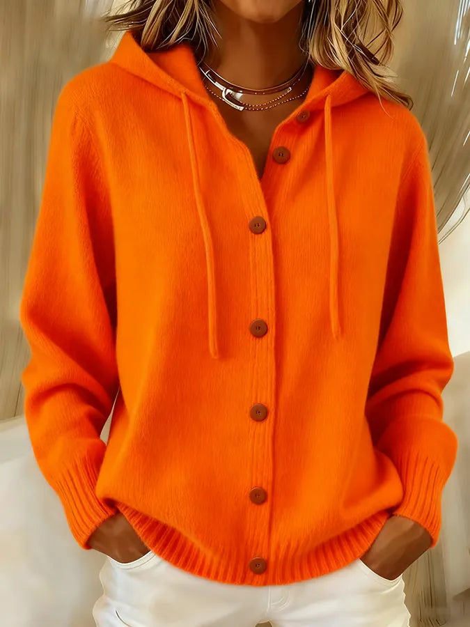 Marcelline orange hooded button-front cardigan, close-up front view