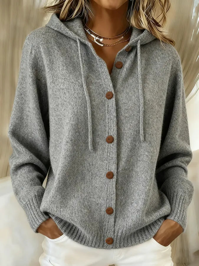 Marcelline orange hooded button-front cardigan, close-up front view