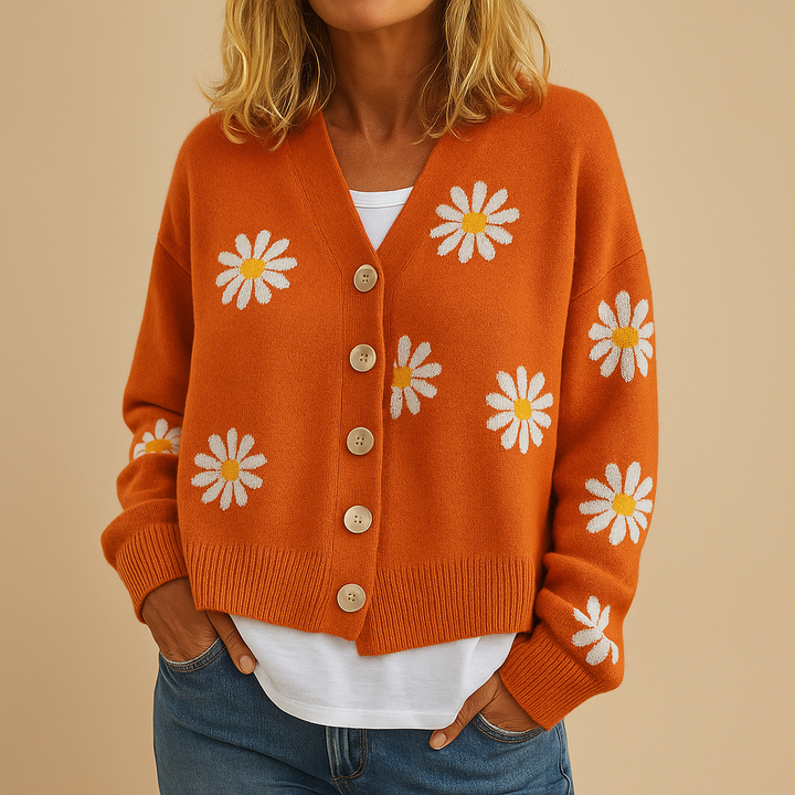 Margaux floral knit cardigan in orange with daisy print, front view