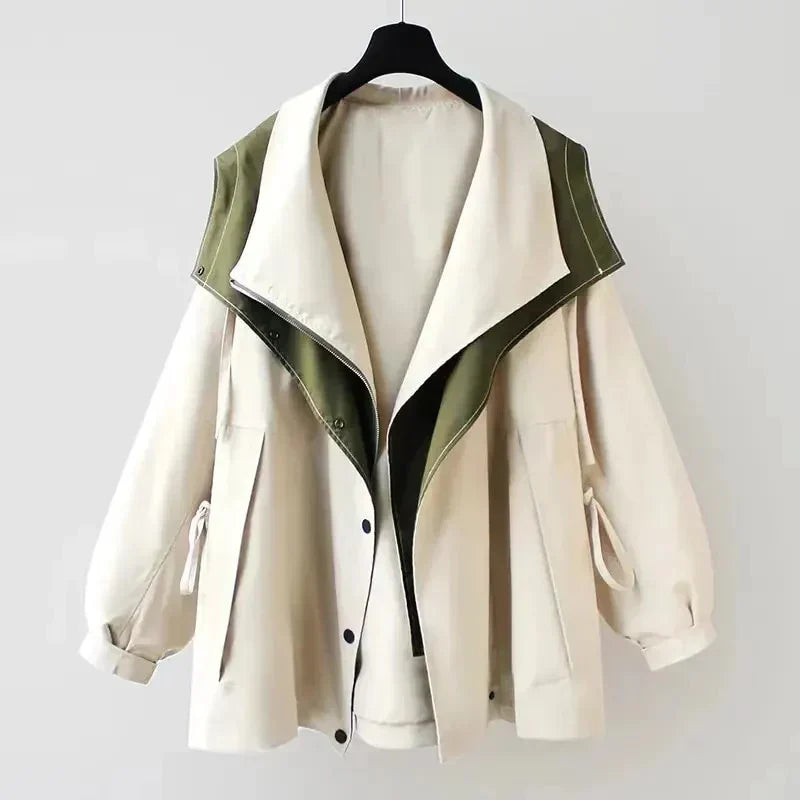 Margaux trench coat reversed to cream side, front view on hanger