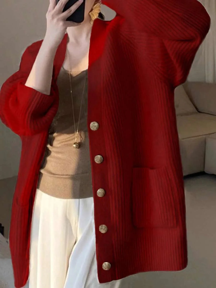 Margeaux oversized V-neck cardigan with front pockets, styled with leggings