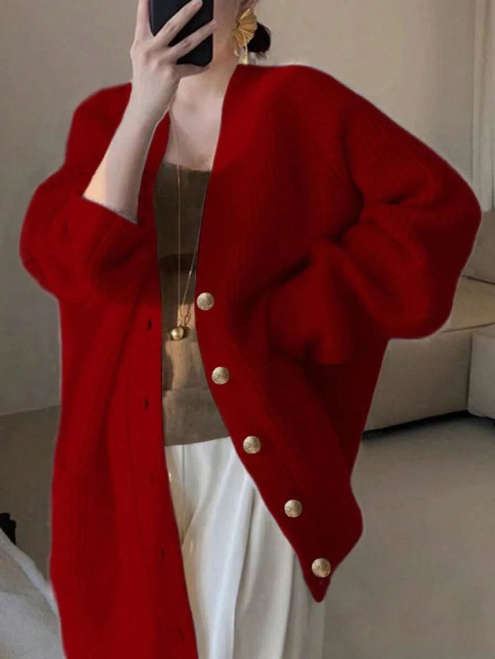 Margeaux oversized V-neck cardigan with front pockets, styled with leggings