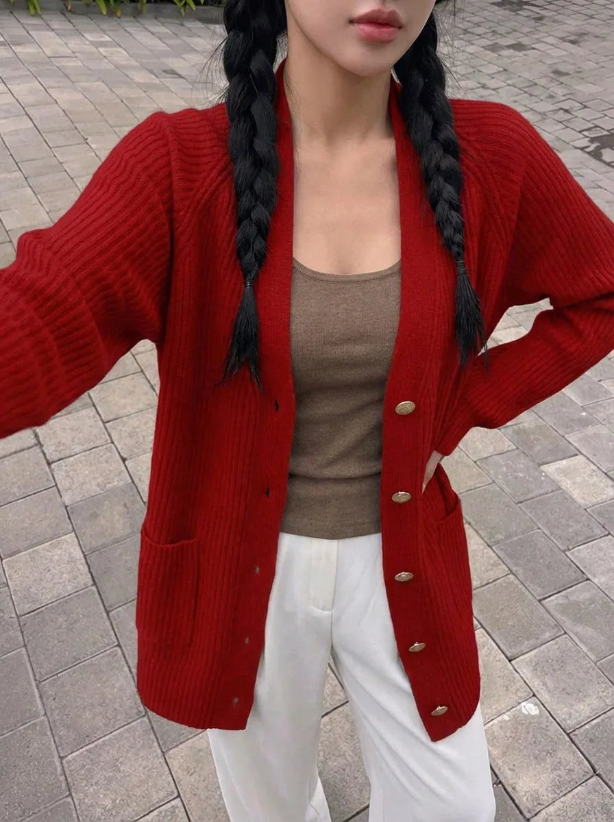 Margeaux oversized V-neck cardigan with front pockets, styled with leggings