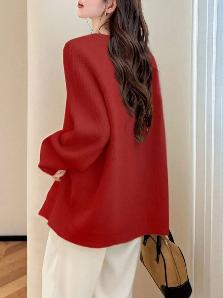Margeaux oversized V-neck cardigan with front pockets, styled with leggings