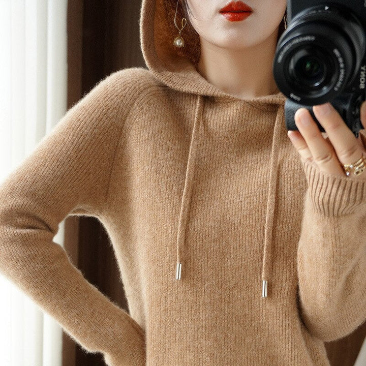 Margot cashmere hoodie in camel with hood up, close-up view