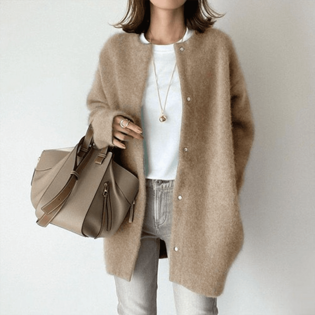 Margot oversized snap button cardigan in camel, front view with tote bag