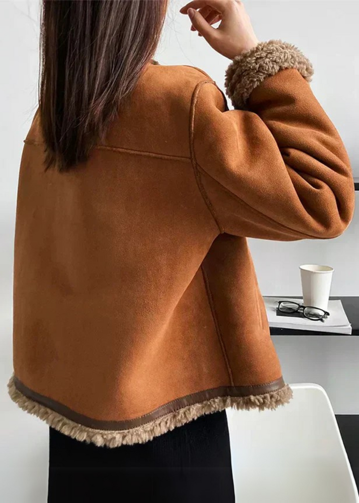 Marigold shearling lined jacket back view showing hem trim detail