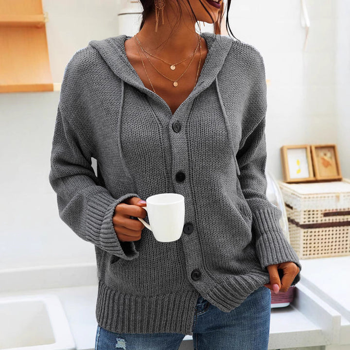 Marisela hooded chunky knit cardigan in gray, close-up front view with button detail