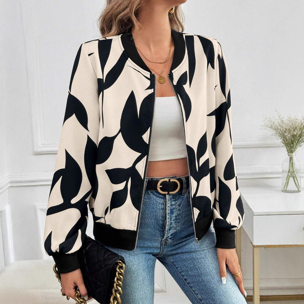Marisela floral print bomber jacket, front view with handbag