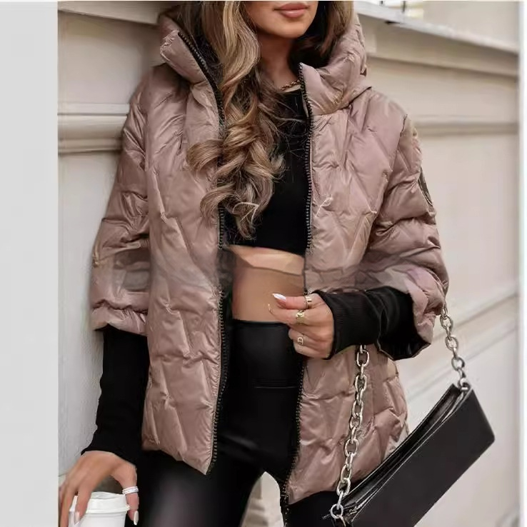 Marisela quilted puffer jacket styled with black leggings, close-up front view