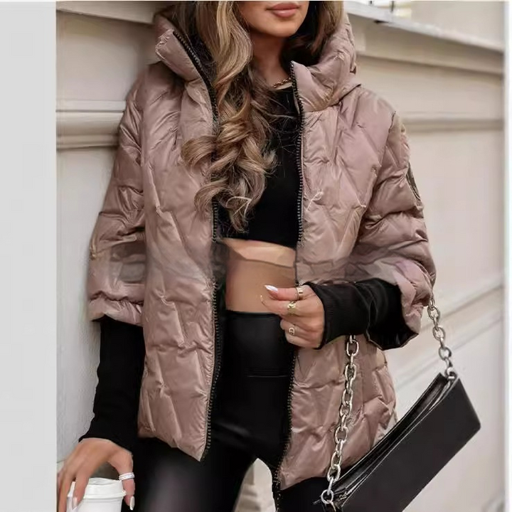 Marisela quilted puffer jacket styled with black leggings, close-up front view