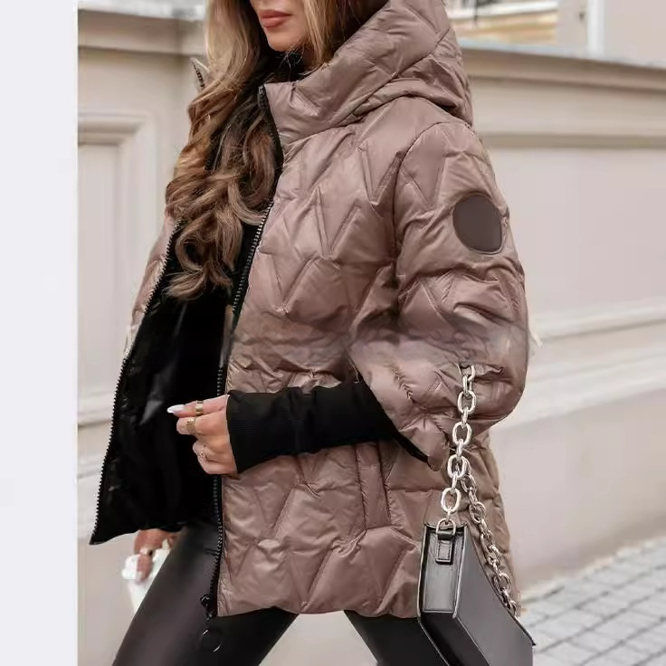 Marisela quilted puffer jacket, side profile view showing hood and sleeve detail
