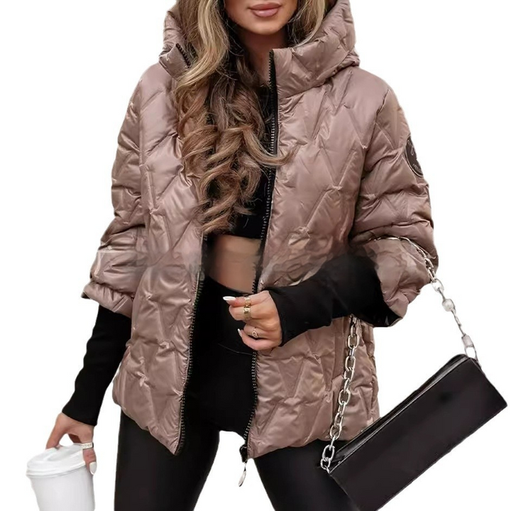 Marisela quilted puffer jacket, back view showing hood up and patchwork texture