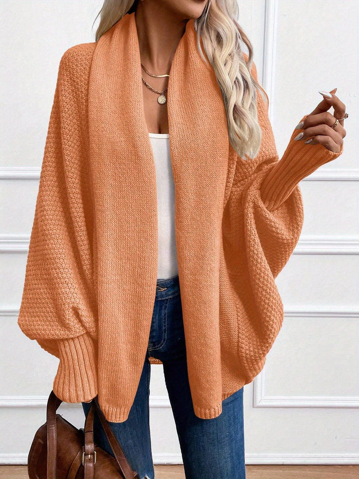 Marisol draped shawl-collar cardigan in orange, front view
