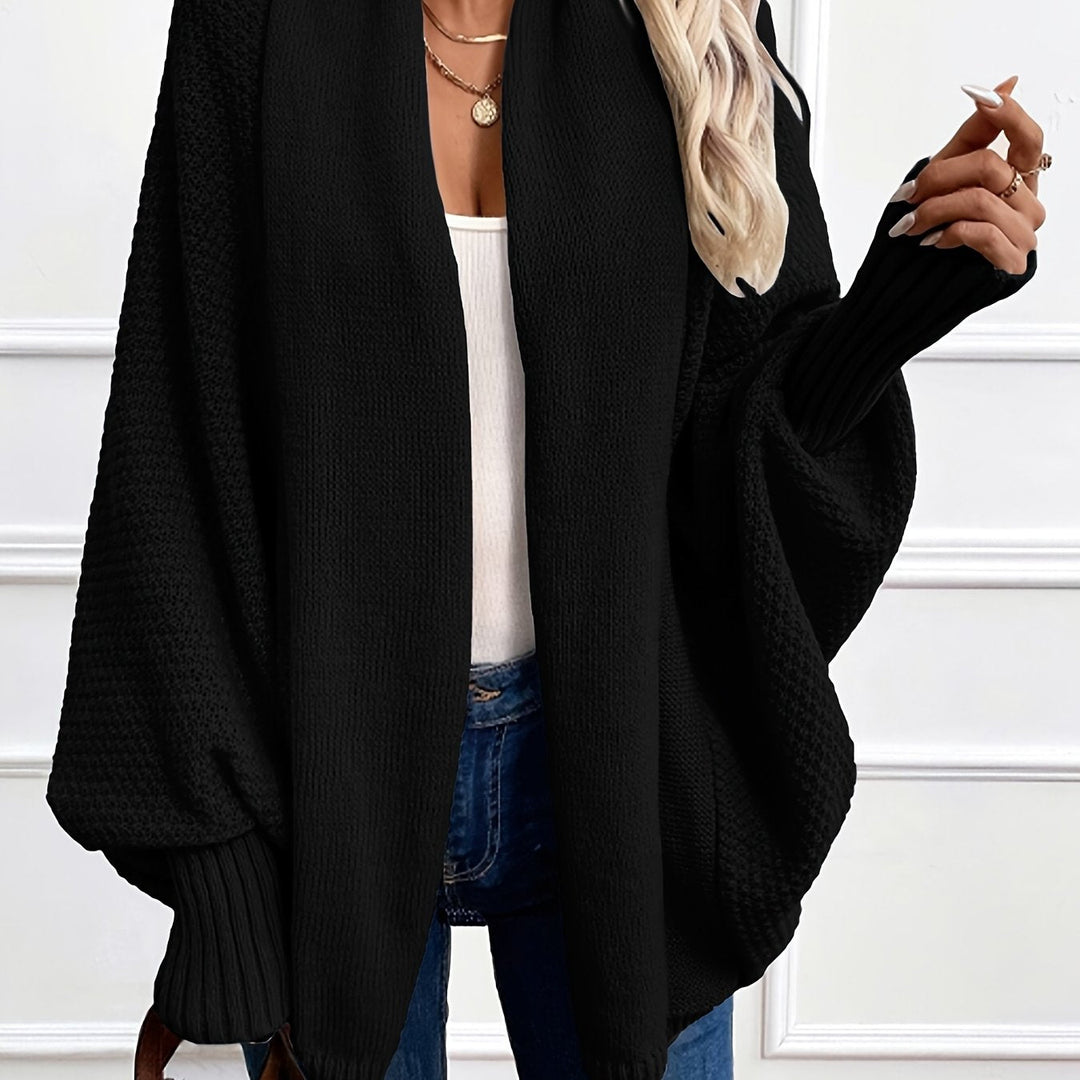 Marisol draped shawl-collar cardigan in black, front view close-up