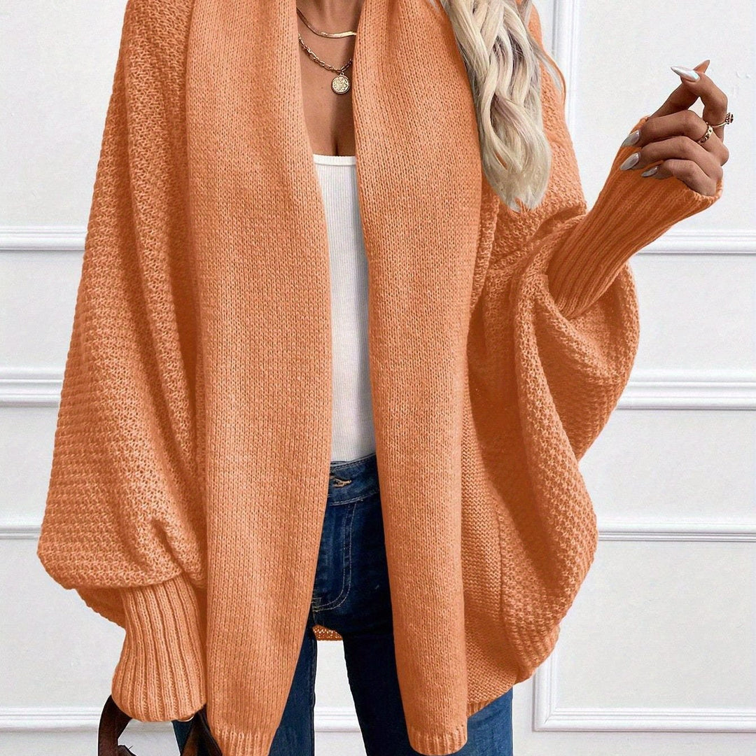 Marisol draped shawl-collar cardigan in orange, front view close-up