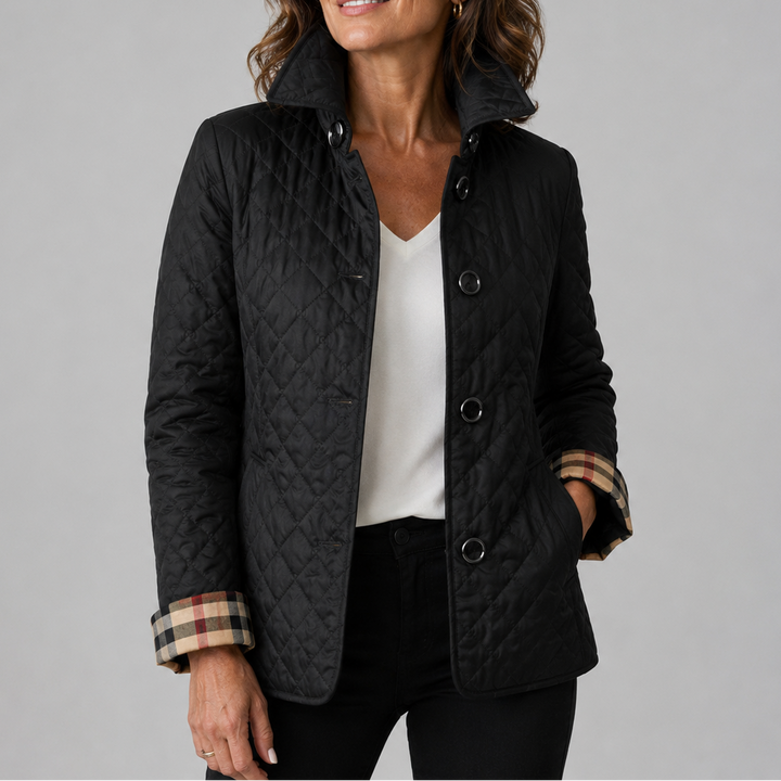 Marisol quilted jacket in black with plaid cuff detail, front view