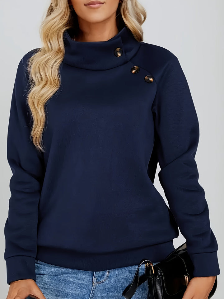 Marisol stand collar sweater close-up showing button detail