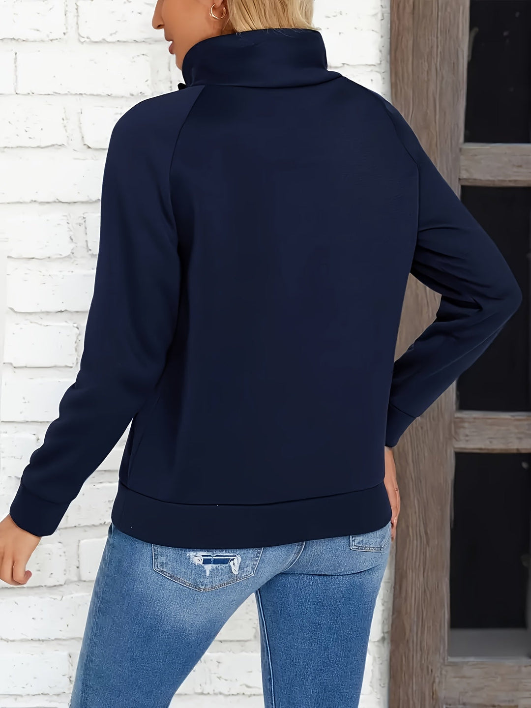 Marisol stand collar sweater, back view showing relaxed fit