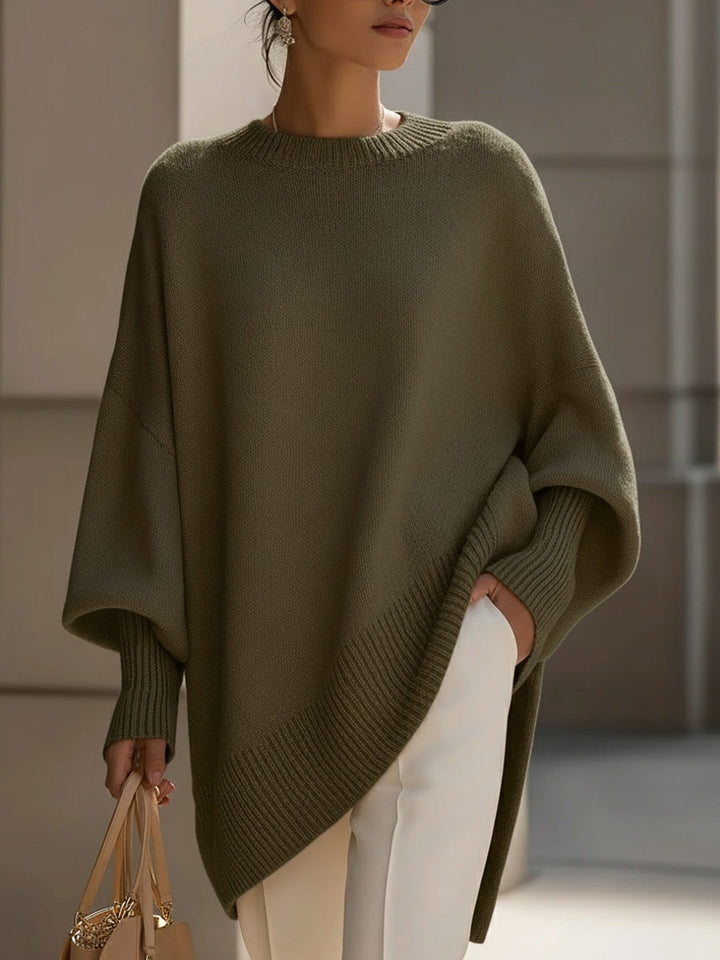 Marlowe oversized asymmetrical poncho sweater in olive green, front view