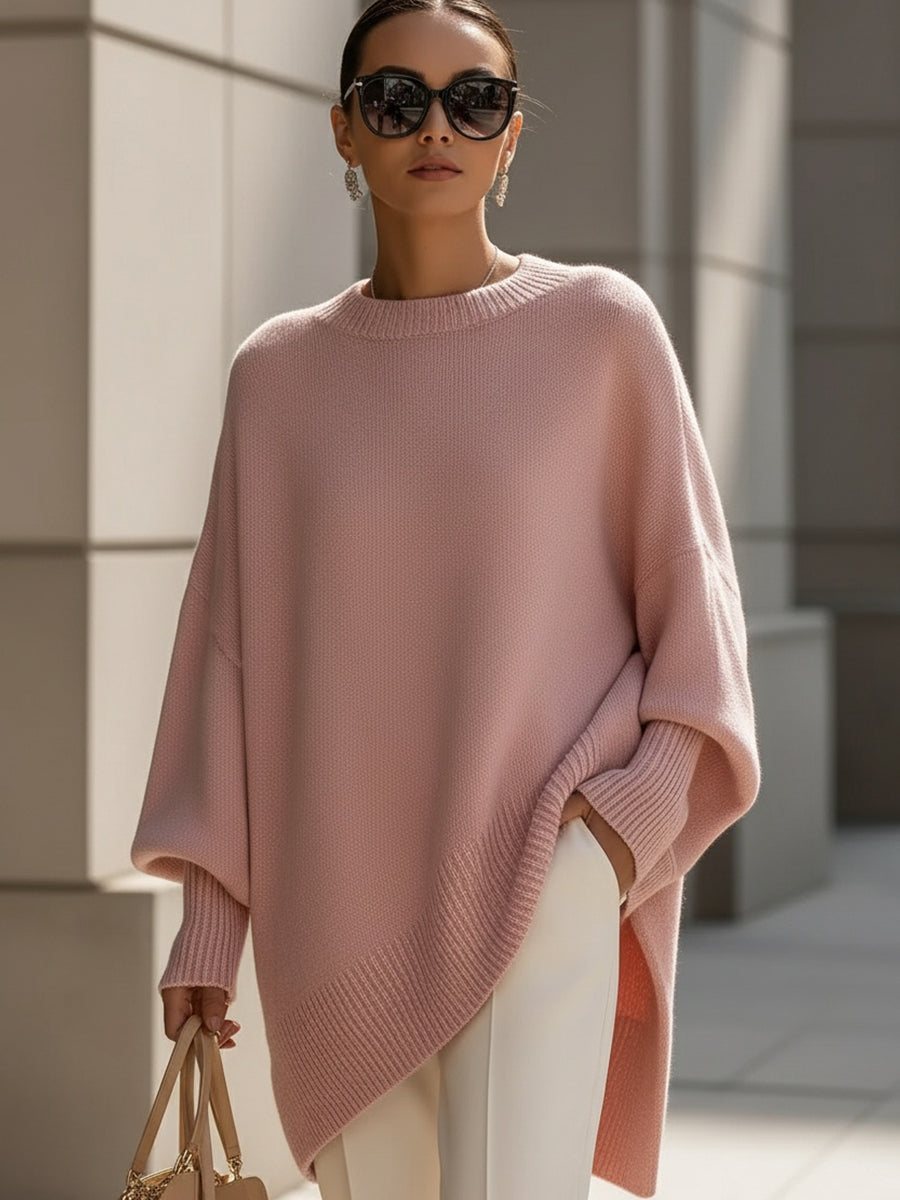 Marlowe oversized asymmetrical poncho sweater in pink, front view