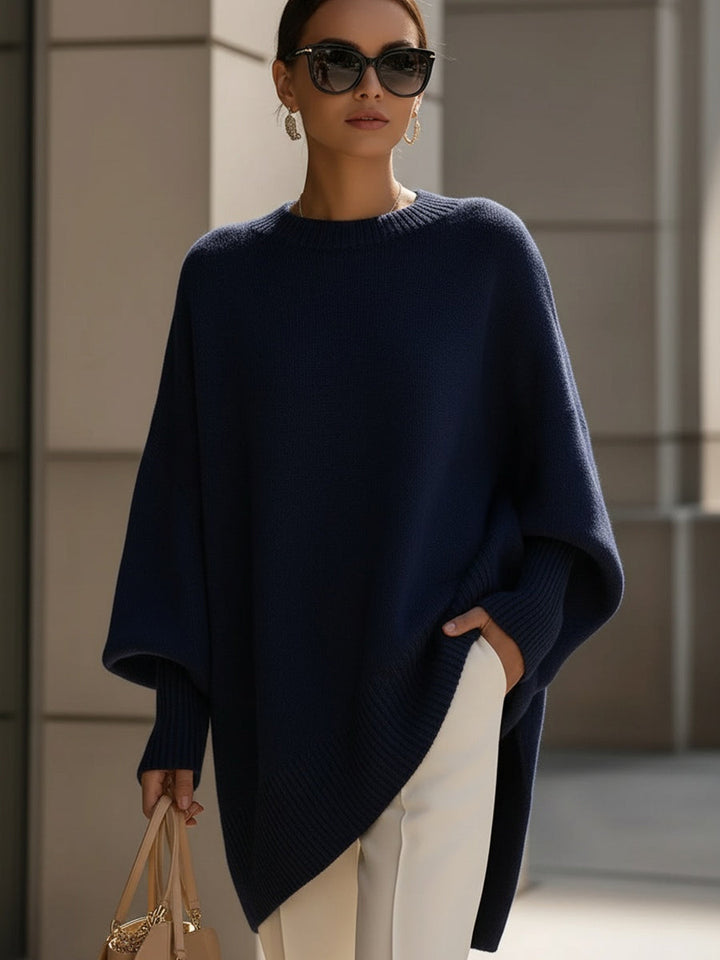 Marlowe oversized asymmetrical poncho sweater in navy blue, front view