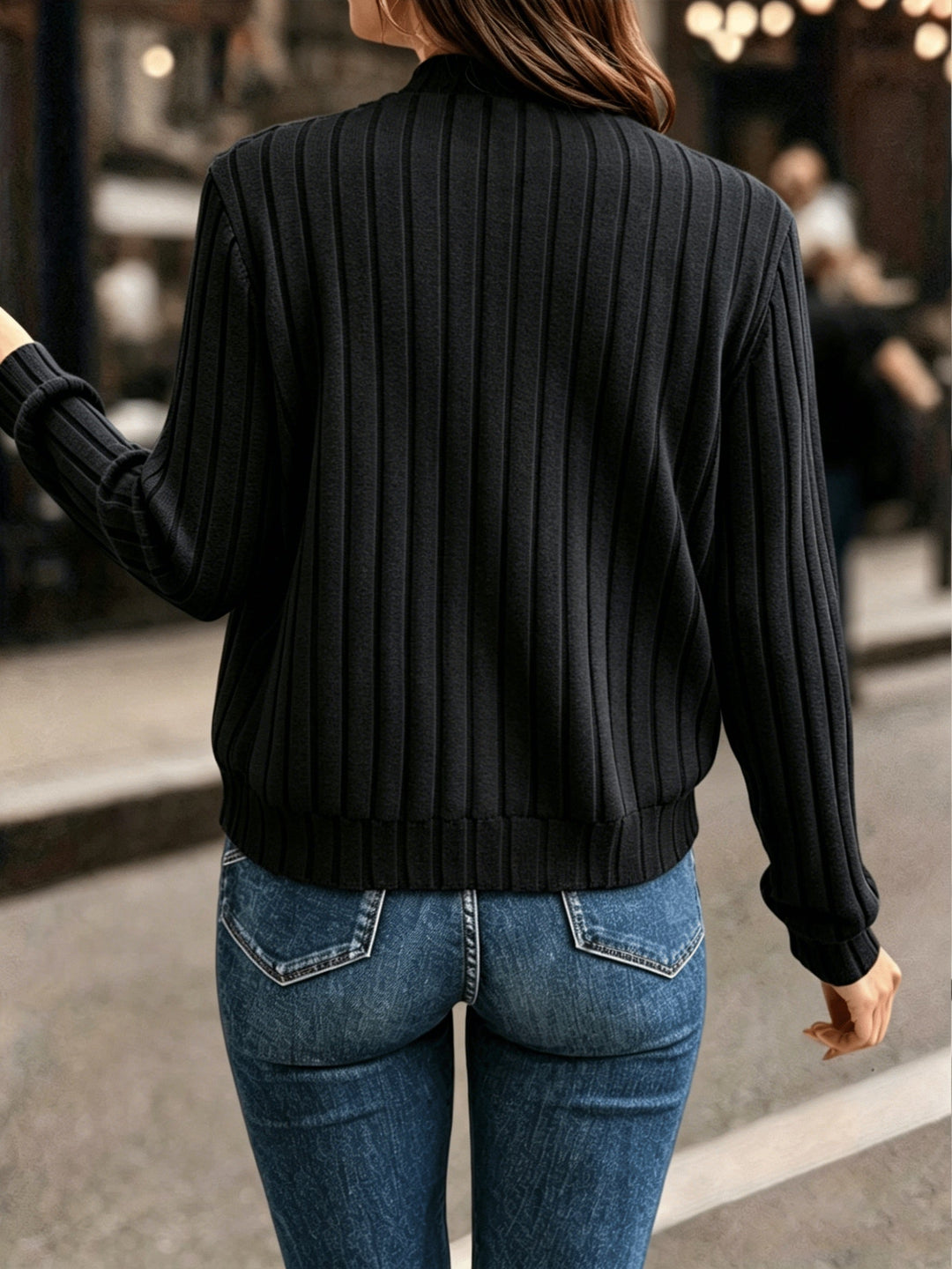 Marlowe ribbed zip-front cardigan in black, styled with crossbody bag