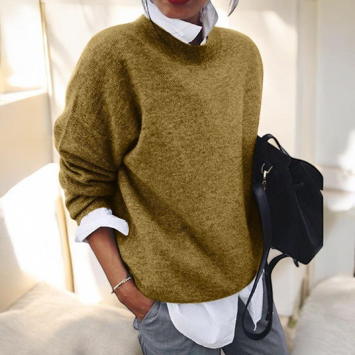 Molly oversized mock neck sweater in olive green, front view layered over white shirt