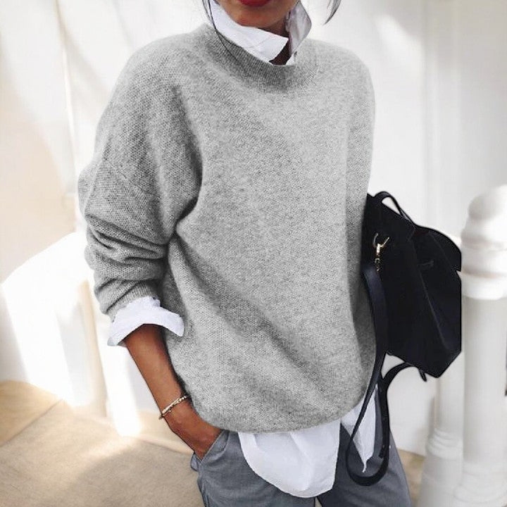 Molly oversized mock neck sweater in gray, front view layered over white shirt