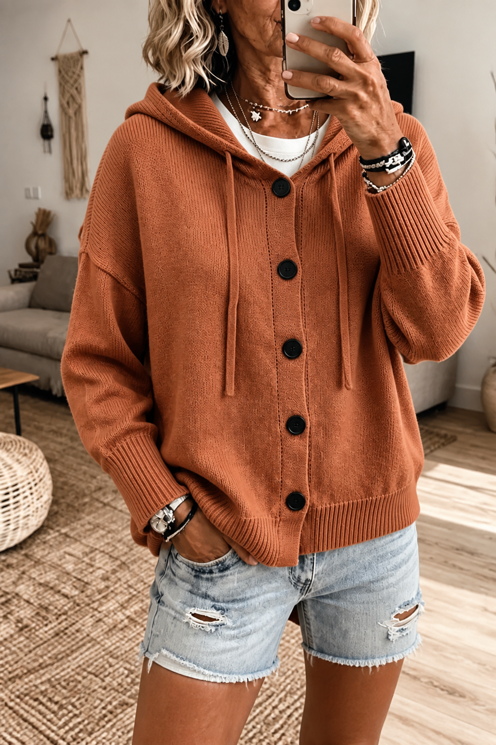 Rosalind hooded ribbed knit cardigan, styled outdoors with hood pulled up