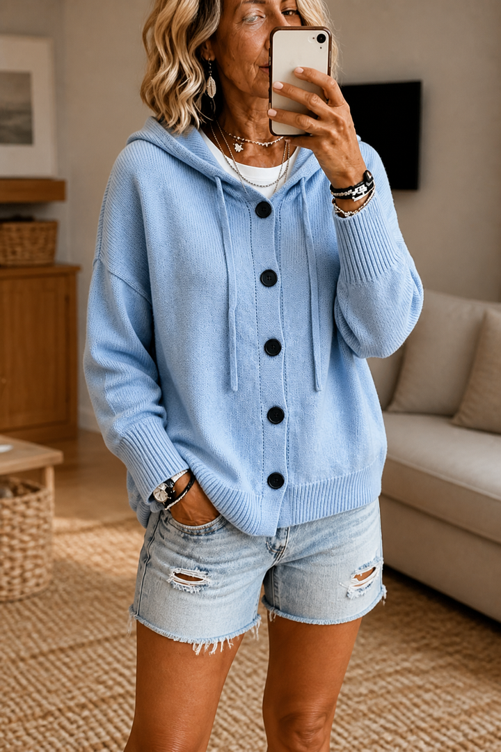 Rosalind hooded ribbed knit cardigan, styled outdoors with hood pulled up