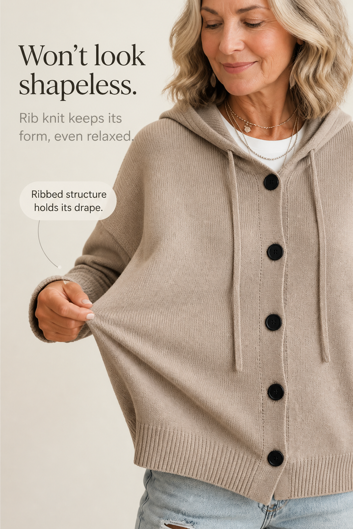 Rosalind hooded ribbed knit cardigan, styled outdoors with hood pulled up