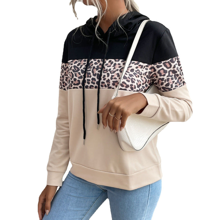 Sienna hoodie side view paired with white shoulder bag