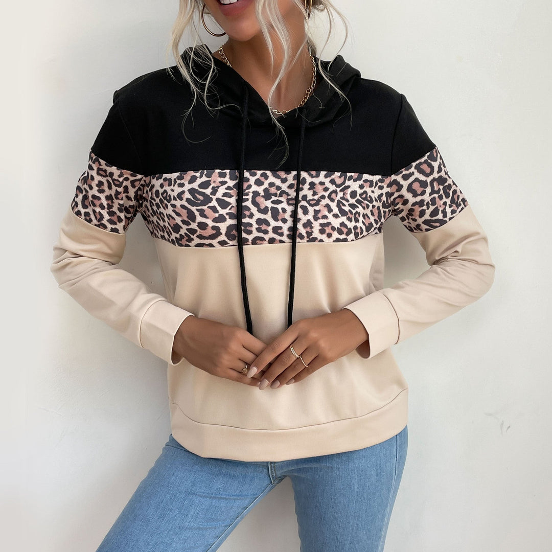 Sienna leopard print colorblock hoodie front view with model smiling