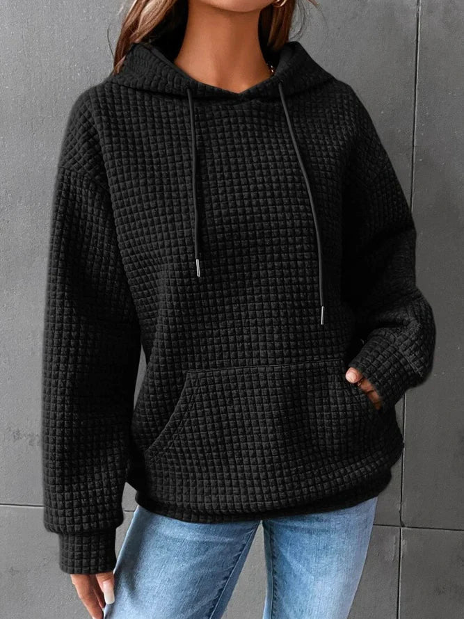 Sienna waffle knit hoodie in black, front view with drawstring hood