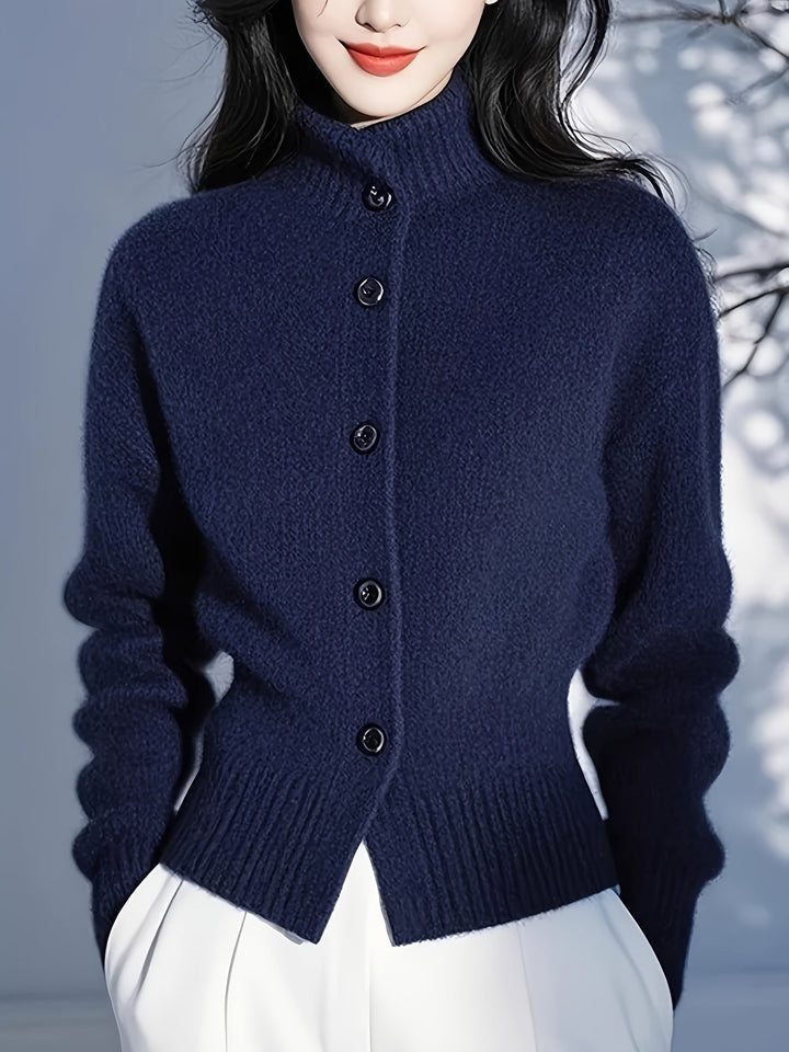 Simone high-neck button cardigan in navy, close-up back button and hem detail