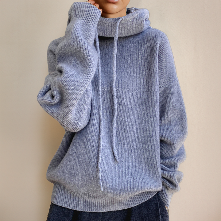 Sloane oversized cowl neck hoodie in blue-gray, sleeve pulled up detail