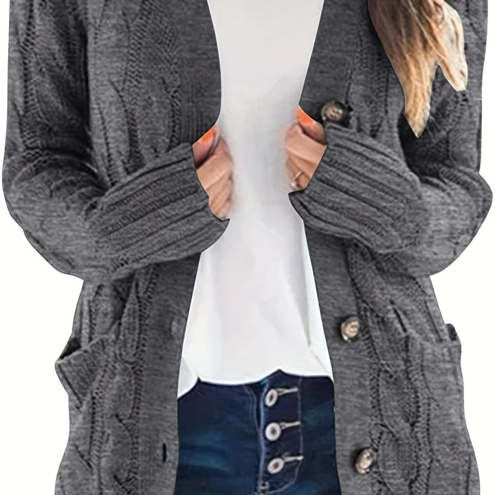 Vivienne cable knit button cardigan in dark gray, front view with hands in pockets