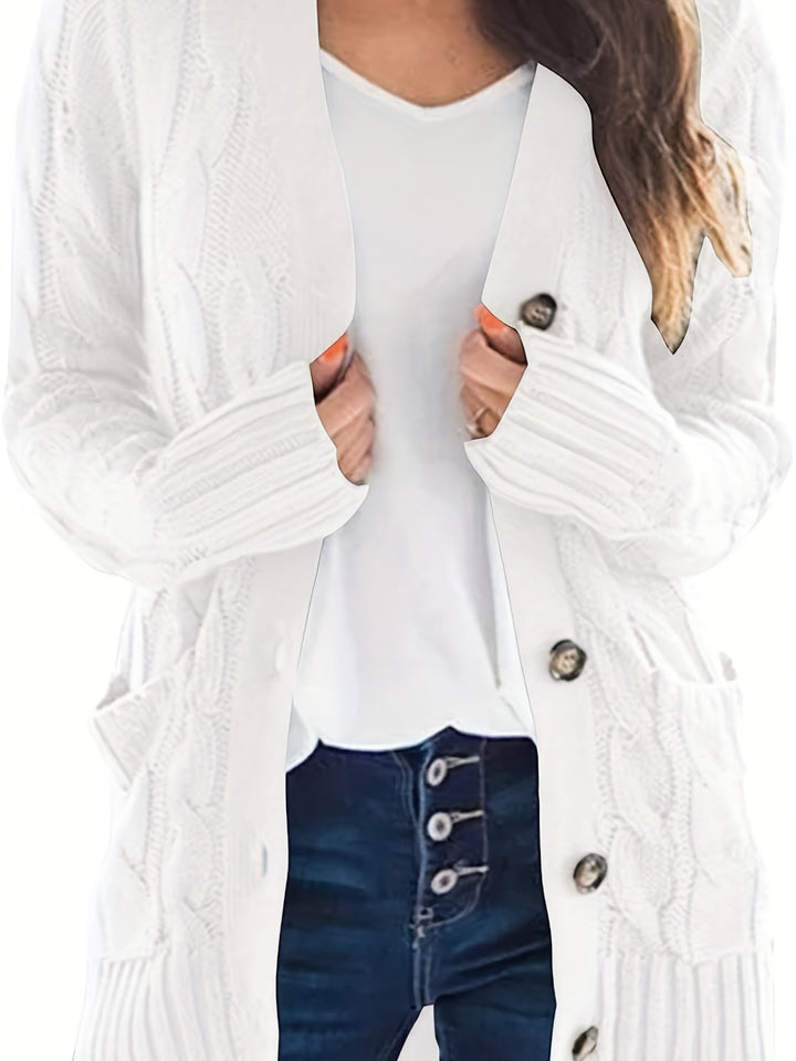Vivienne cable knit button cardigan in white, front view with hands in pockets